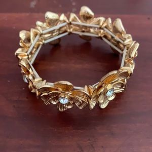 Golden floral bracelet, faux diamonds in centers
